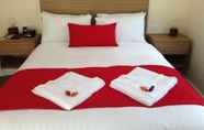 Kamar Tidur 6 Huskisson Beach B&B