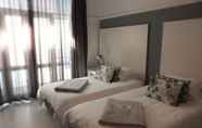 Kamar Tidur 4 The Hampton Exclusive Guest House