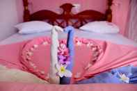 Kamar Tidur Blue Eyes Inn