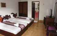 Kamar Tidur 5 Suksavanh River Hotel