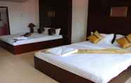 Kamar Tidur 6 Suksavanh River Hotel