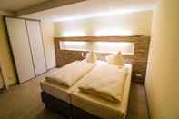 Kamar Tidur Petul Apart Hotel Ernestine