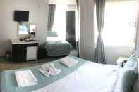 Bedroom Grand Heykel Hotel