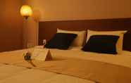 ห้องนอน 2 Yihua Hotel