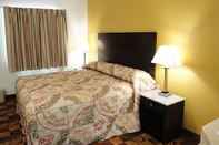 Bedroom Sands Inn & Kitchen Suites