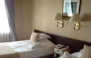 Bedroom 2 Okayama Plaza Hotel