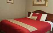 Kamar Tidur 3 Niagara Inn & Suites