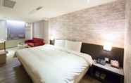 Kamar Tidur 4 Smile 73 Hotel