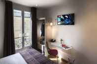 ห้องนอน Hôtel Le Mireille