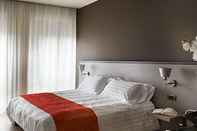 Bedroom Zara Rooms & Suites