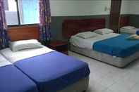 Bedroom Suria Beach Resort