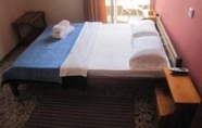 Kamar Tidur 4 Hotel Alexandrion