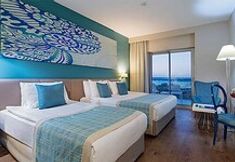 침실 7 Seashell Resort & Spa