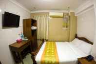 Kamar Tidur May Shan Hotel