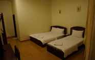 Kamar Tidur 5 Sinnakhone Hotel
