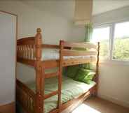 Bedroom 4 Freshwater Bay Holiday Cottages