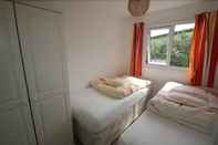 Bilik Tidur Freshwater Bay Holiday Cottages