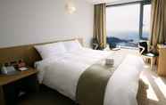 ห้องนอน 5 M-Stay Hotel Jeju