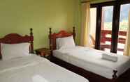 Kamar Tidur 5 Popular View Guesthouse