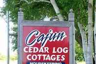 Bangunan Cajun Cedar Log Cottages