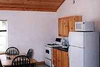 Bedroom Chisholms of Troy Coastal Cottages