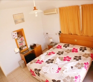 Bilik Tidur 7 Apollonia Holiday Apartments