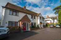 Exterior Red Mullions Guest House