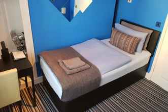 Kamar Tidur 4 Robin 7 Lodge City Centre