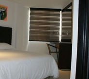 Bedroom 2 Hotel Boutique Calle Grande