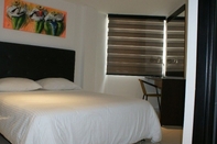 Bedroom Hotel Boutique Calle Grande