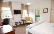 Kamar Tidur 5 The Captain Cook Hotel