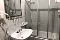 Phòng tắm bên trong Hotel Ripa