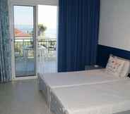 Bedroom 6 Xenios Faros Apartments