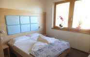 Kamar Tidur 3 Aparthotel Dolomites Living&Relax