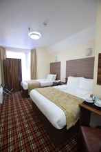 Kamar Tidur 4 Lucky 8 Hotel