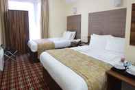 Kamar Tidur Lucky 8 Hotel