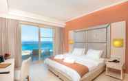 Bedroom 6 Grand Blue Beach Hotel