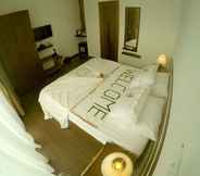 Bedroom 5 Dhiffushi White Sand Beach Hotel