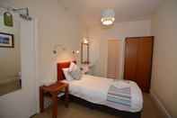 Kamar Tidur Pink Beach Guest House