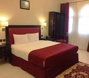 Bedroom 2 Remas Hotel Suites