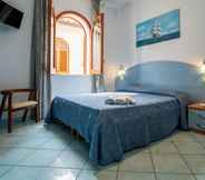 Bedroom 3 Villaggio Residence Testa di Monaco