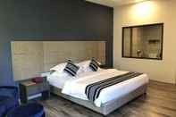 ห้องนอน Kanbawza Hinthar Hotel