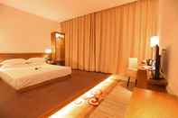 ห้องนอน Cheng Yue Selected Hotel Guangzhou Junye Nangang Branch