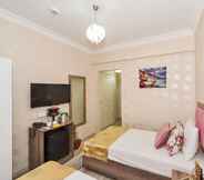 Kamar Tidur 4 Orange Airport Hotel