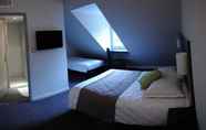 Kamar Tidur 5 Ruthenium Hotel