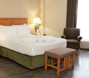 Bedroom 5 Continental Inn & Suites