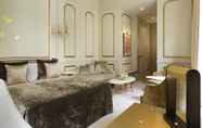 Kamar Tidur 4 Hotel Le Narcisse Blanc & Spa