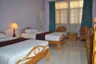 Kamar Tidur Day Inn Hotel