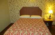 Kamar Tidur 7 Queen Bee Hotel