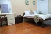 Kamar Tidur Dongshan River Left bank B&B